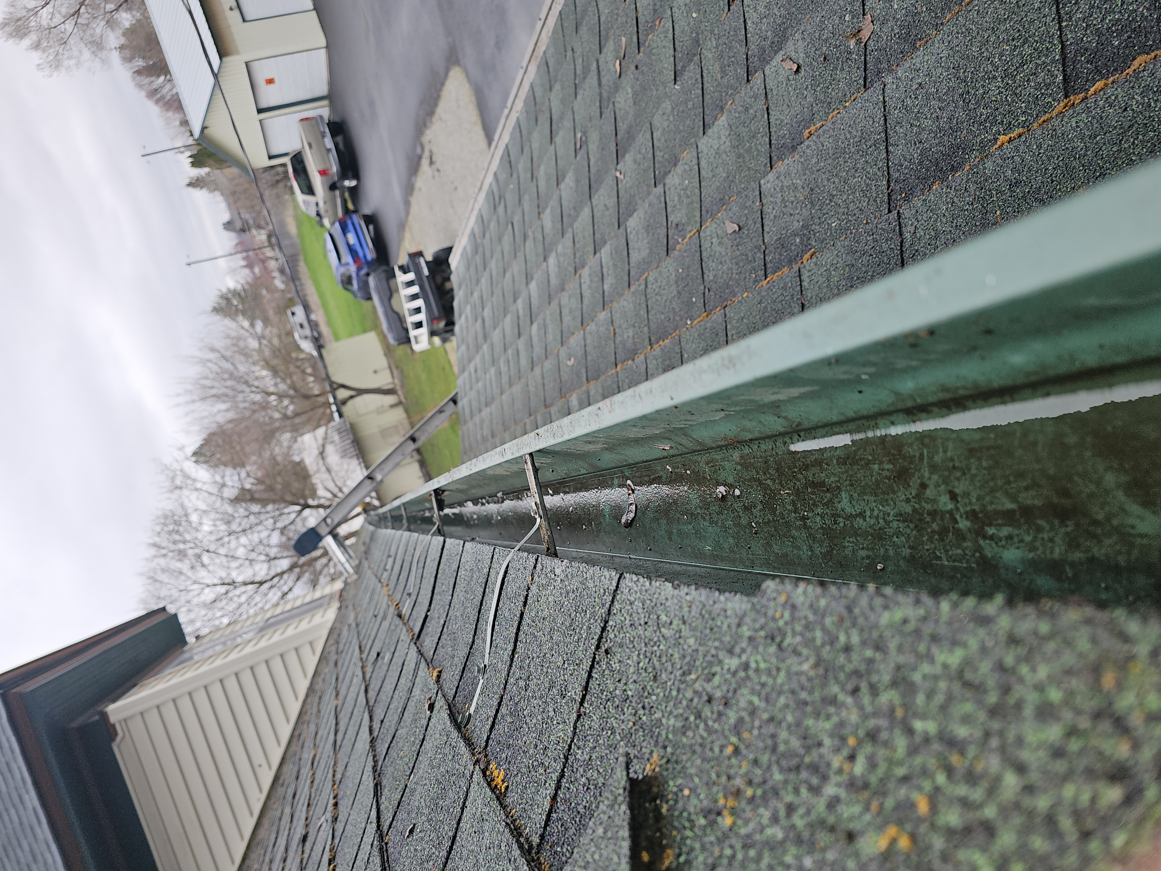 After: Clean gutter flowing smoothly